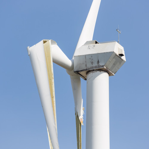 Wind turbine with broken wings after a heavy spring storm in the Netherlands